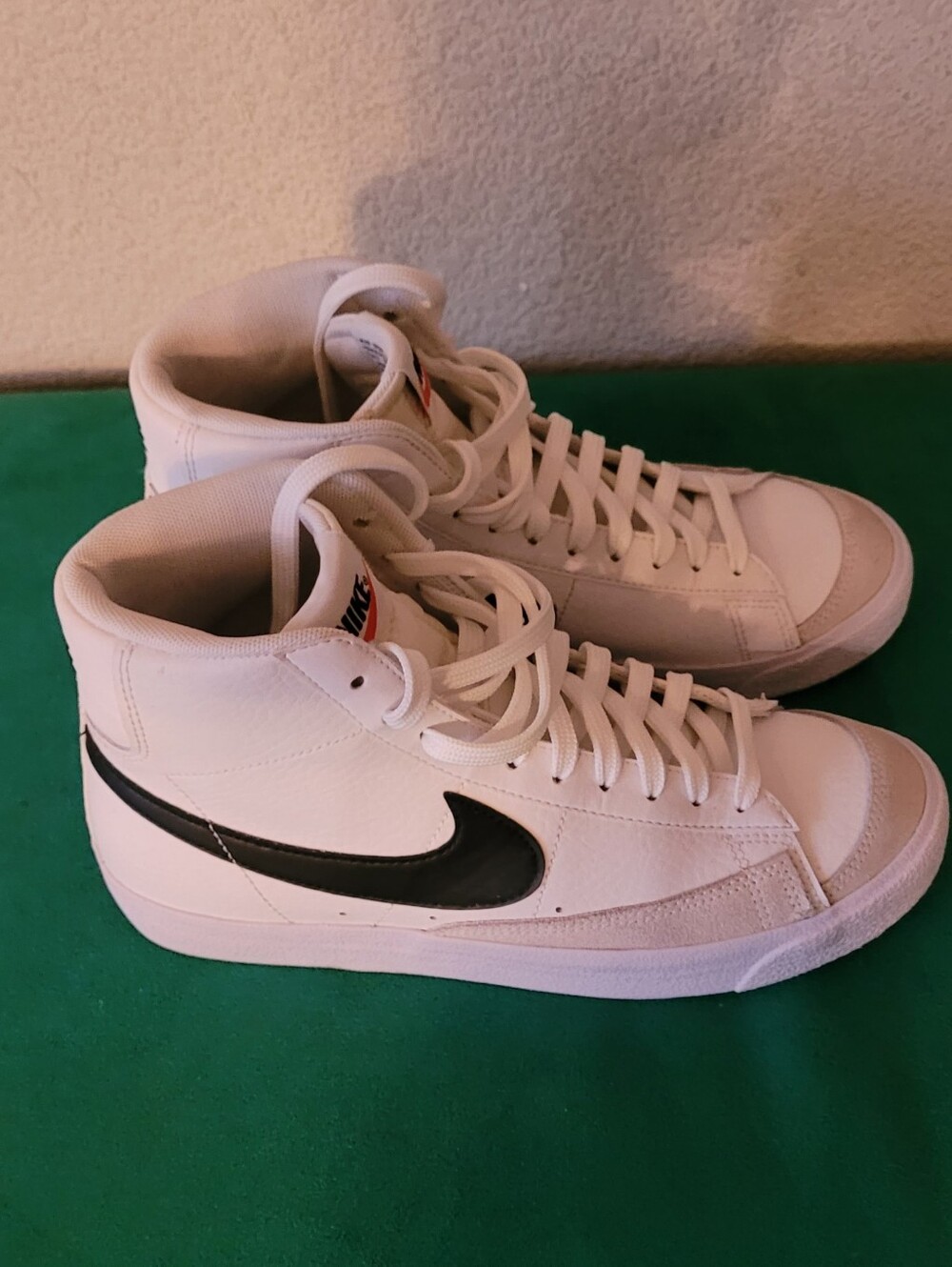 Nike Men’s White High-Top Sneakers with Black Swoosh Blazer